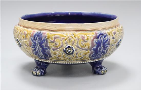 A Doulton Lambeth three legged bowl by Frank A Butler, dated 1883, incised with tracery designs, diameter 25.5cm